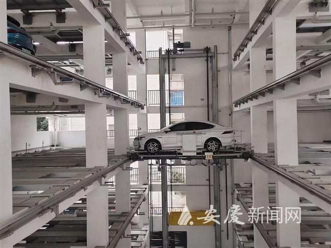 采用平面移动式停车系统车主可全程自助操作安庆首个全自动停车楼试运营(图1)